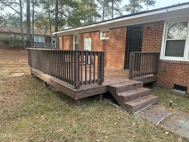 deck featuring a lawn