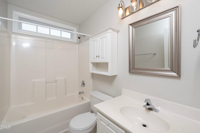 full bathroom with vanity, bathing tub / shower combination, and toilet