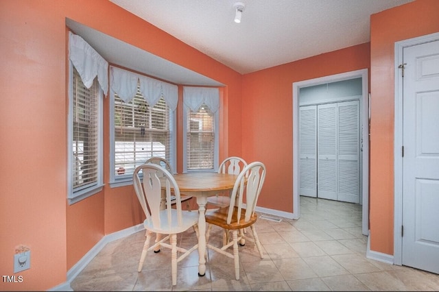 view of tiled dining space