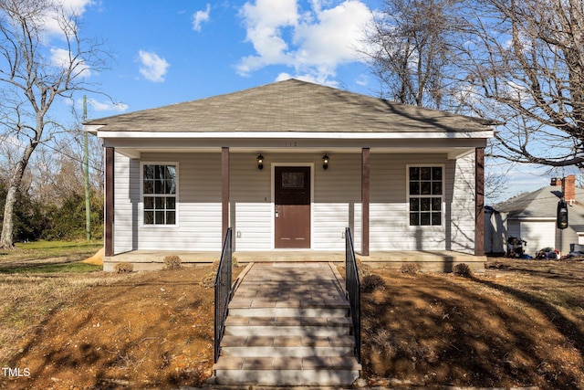 bungalow-style house featuring covered porch