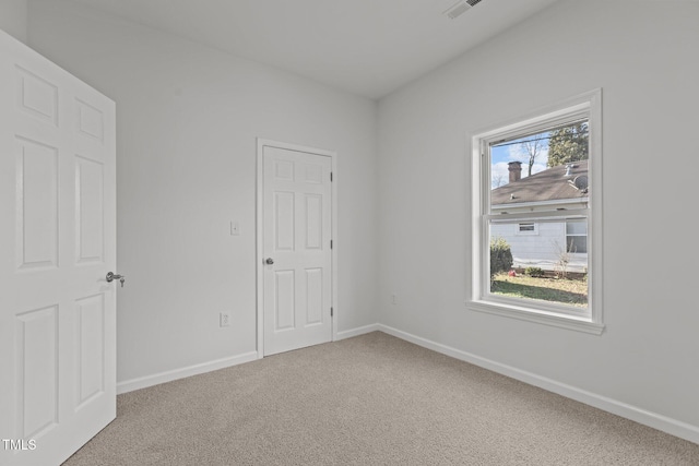 view of carpeted spare room