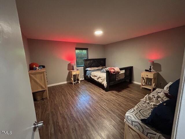 bedroom featuring dark hardwood / wood-style floors