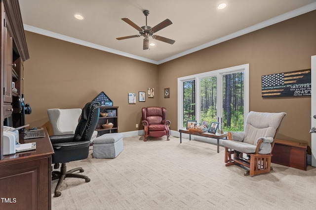 carpeted home office featuring ceiling fan and ornamental molding