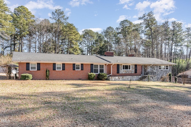 single story home featuring a front yard