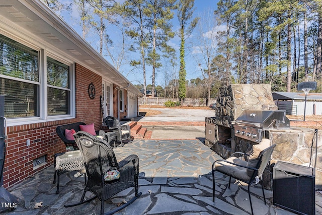 view of patio featuring grilling area