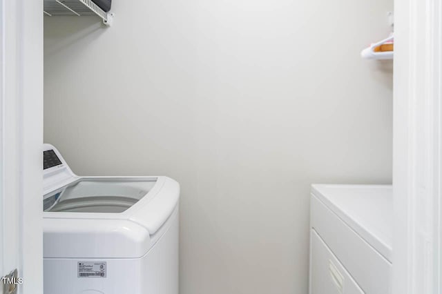 laundry room with washer and dryer