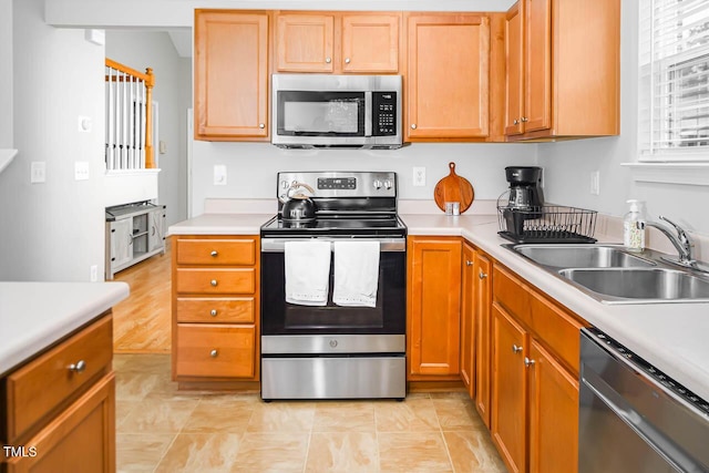 kitchen featuring sink and appliances with stainless steel finishes