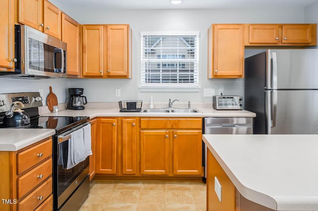 kitchen featuring sink and stainless steel appliances