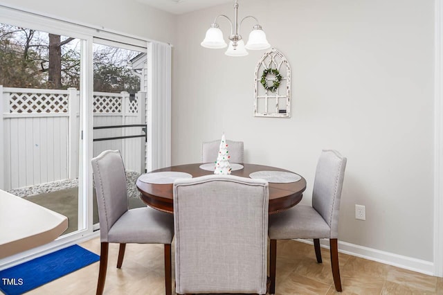 dining area with a chandelier