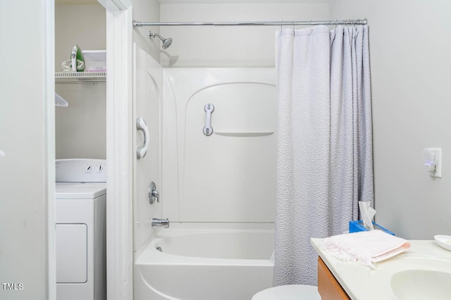 full bathroom with washer / clothes dryer, vanity, shower / tub combo, and toilet