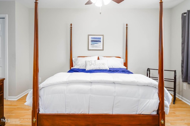 bedroom featuring light hardwood / wood-style floors and ceiling fan