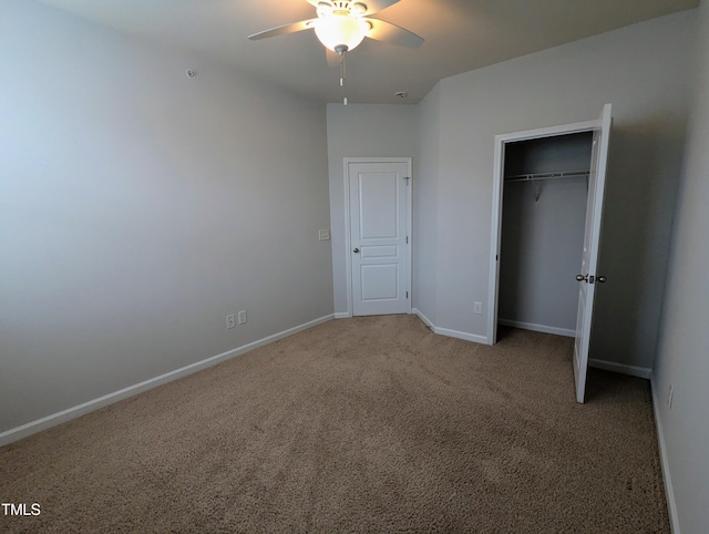 unfurnished bedroom with carpet floors, a closet, and ceiling fan