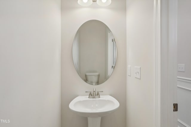 bathroom with sink and toilet