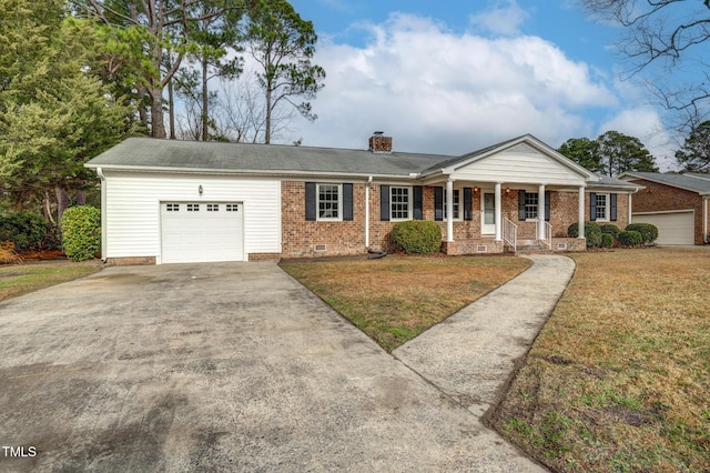 ranch-style home with a garage, covered porch, and a front lawn