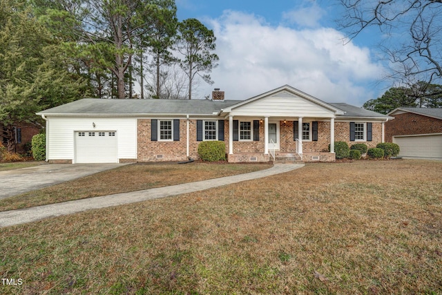 ranch-style home with a garage, a front lawn, and covered porch