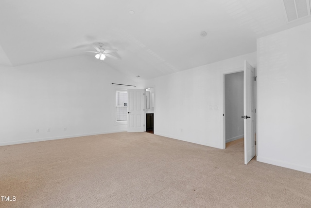 unfurnished living room featuring light carpet, ceiling fan, and lofted ceiling