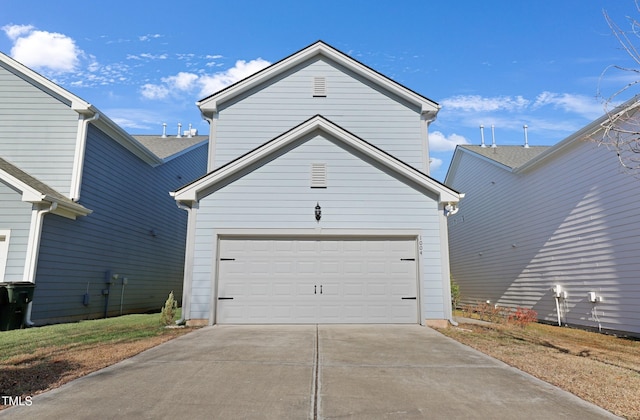 exterior space with a garage