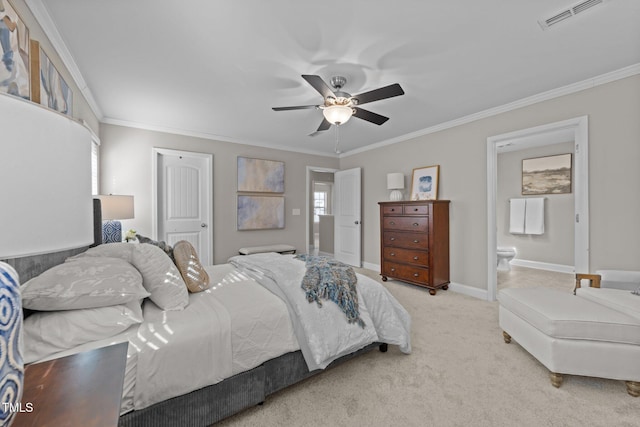 carpeted bedroom with crown molding, ceiling fan, connected bathroom, and a closet