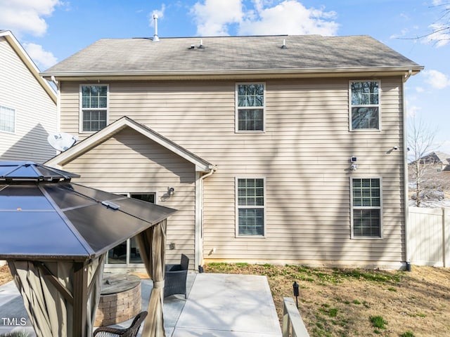 back of house with a patio area