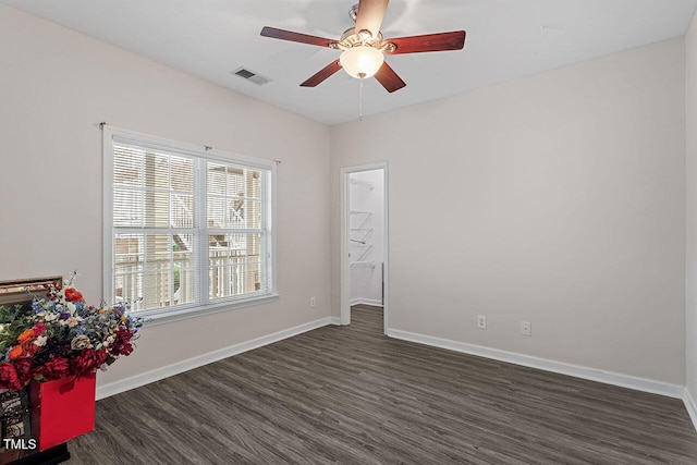 524 Glenolden Ct, Cary, NC 27513 - unfurnished room featuring dark wood-style floors and a ceiling fan