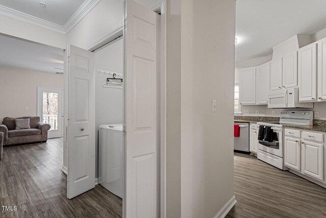 kitchen with white cabinets, range with electric cooktop, crown molding, stainless steel dishwasher, and dark hardwood / wood-style flooring