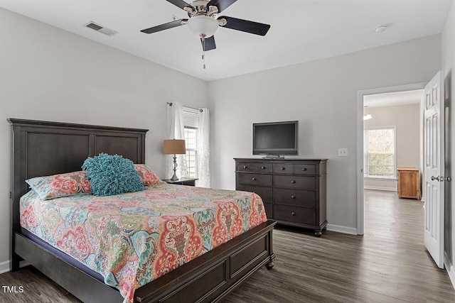 524 Glenolden Ct, Cary, NC 27513 - bedroom featuring dark wood-style floors and ceiling fan