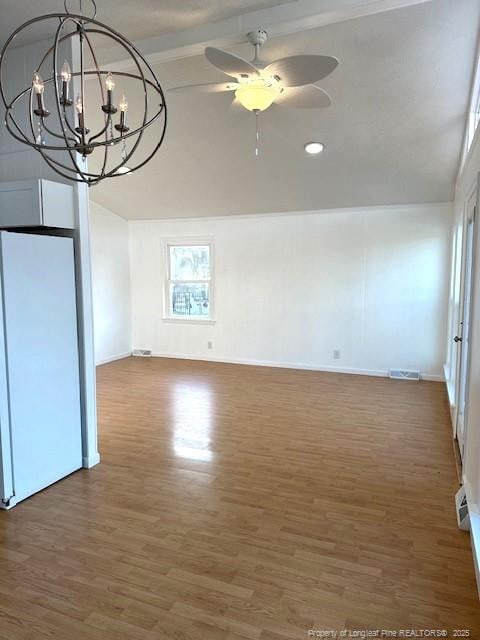 interior space with vaulted ceiling with beams, dark hardwood / wood-style flooring, and ceiling fan with notable chandelier