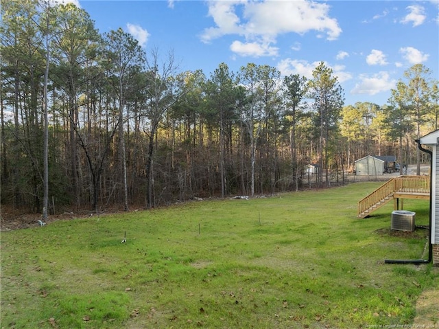 view of yard featuring central AC