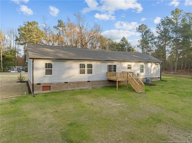 back of house featuring a lawn, cooling unit, and a deck