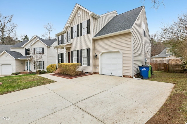 traditional-style house with a garage, fence, driveway, roof with shingles, and a front lawn