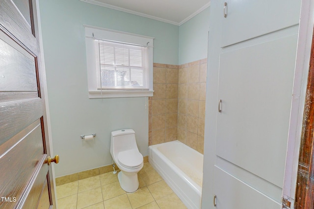 bathroom featuring tile patterned flooring, a bathtub, toilet, and crown molding