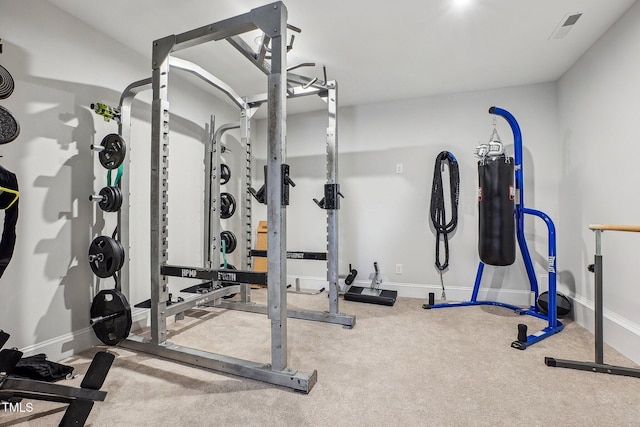 exercise room with carpet floors