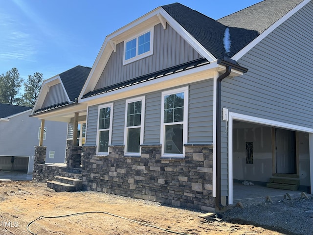 view of property exterior with a garage