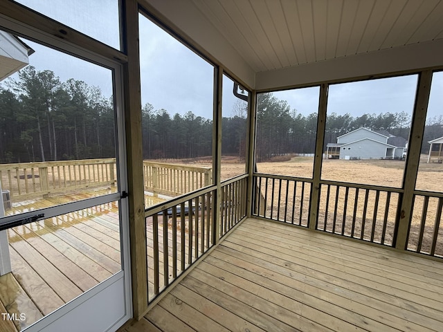 unfurnished sunroom with a healthy amount of sunlight