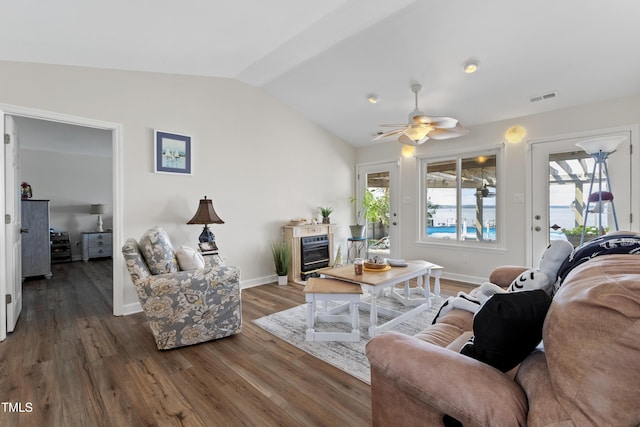 living room with dark hardwood / wood-style floors, ceiling fan, and lofted ceiling