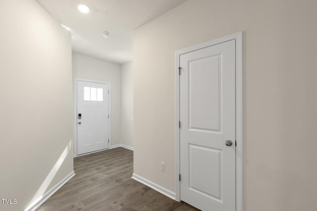 foyer entrance with hardwood / wood-style flooring