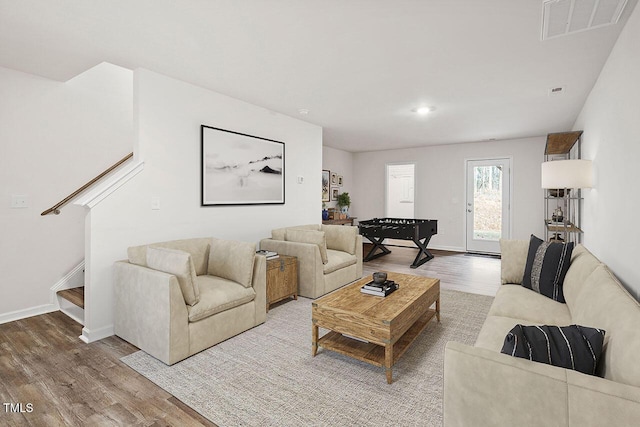 living room with hardwood / wood-style flooring