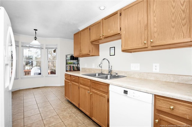 58 Bayleaf Ln, Sanford, NC 27332 - kitchen with light countertops, crown molding, white appliances, light tile patterned floors, and a sink