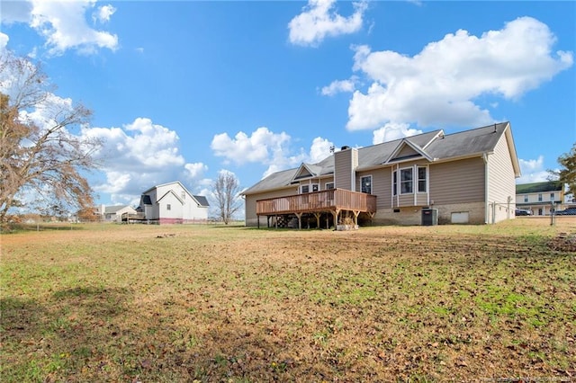 58 Bayleaf Ln, Sanford, NC 27332 - rear view of house featuring cooling unit, a lawn, a wooden deck, and crawl space