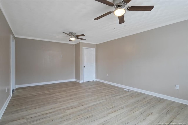 unfurnished room with ceiling fan, light hardwood / wood-style flooring, and ornamental molding