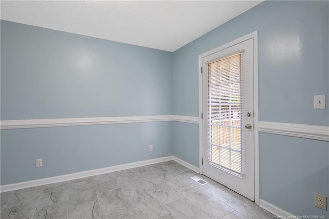 doorway to outside featuring a wealth of natural light