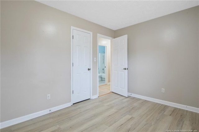 unfurnished bedroom featuring light hardwood / wood-style floors