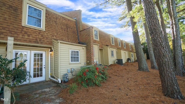 view of home's exterior with central air condition unit