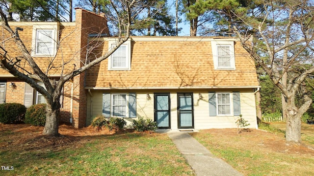 view of front of house with a front yard