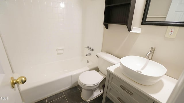 full bathroom featuring tile patterned floors, vanity, toilet, and shower / washtub combination