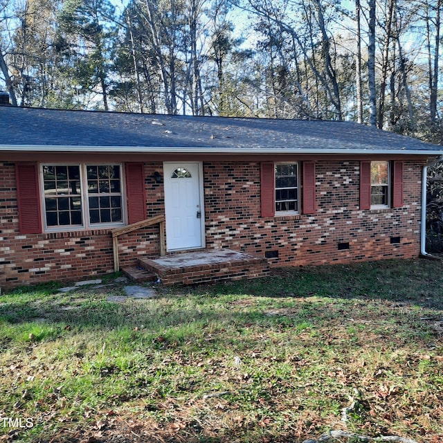 single story home with a front lawn