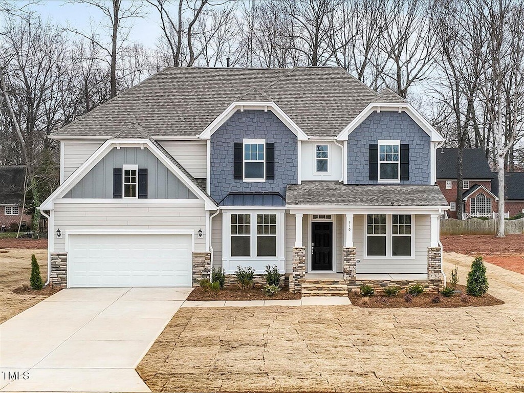 craftsman house featuring a garage