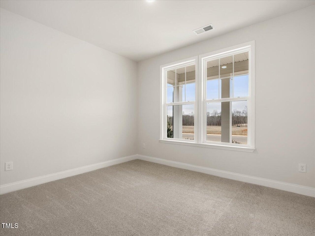 empty room with carpet floors