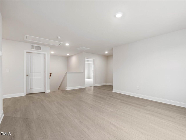 spare room featuring light hardwood / wood-style floors