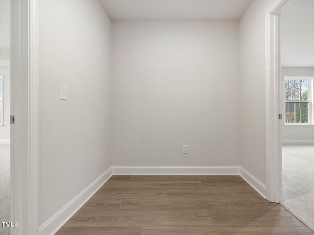 empty room featuring hardwood / wood-style flooring